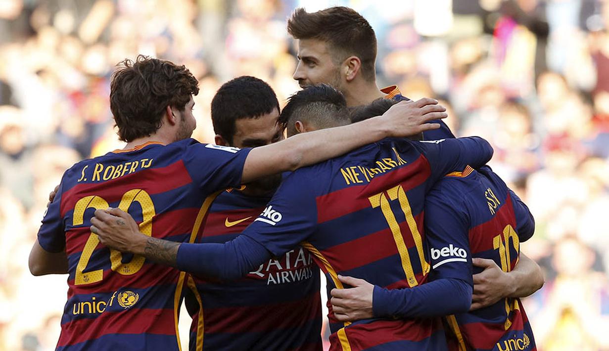 Para pemain Barcelona merayakan gol yang dicetaknya ke gawang Getafe. Selain Messi, gol-gol Barca juga dicetak oleh, Munir, Arda Turan dan dua gol Neymar serta gol bunuh diri oleh Juan Rodriguez. (Reuters/Albert Gea)