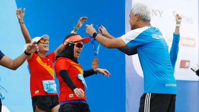 Ganjar dan istri, Siti Atikoh mengikuti ajang Pocari Sweat Run Indonesia 2022 pada Minggu (24/7), di Kota Bandung