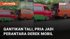 Seorang pria lakukan aksi heroik saat sedang derek mobil mogok mengundang perhatian