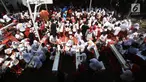 Puluhan siswa-siswi menggosok gigi pada Hari Kesehatan Gigi dan Mulut Sedunia 2018 di SDN Tebet Timur 01 Pagi, Jakarta, Selasa (20/3). Kegiatan ini mengajak siswa untuk lebih peduli menjaga kesehatan gigi dan mulut. (Liputan6.com/Pool/Doni)