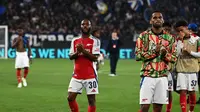 Ekspresi bintang Arsenal, Raheem Sterling (kiri) selepas pertandingan kontra Atalanta  pada matchday pertama Liga Champions 2024/2025, di Stadion Atleti Azzurri d'Italia, Jumat (20/9/2024) dini hari WIB. (Isabella Bonotto/AFP)