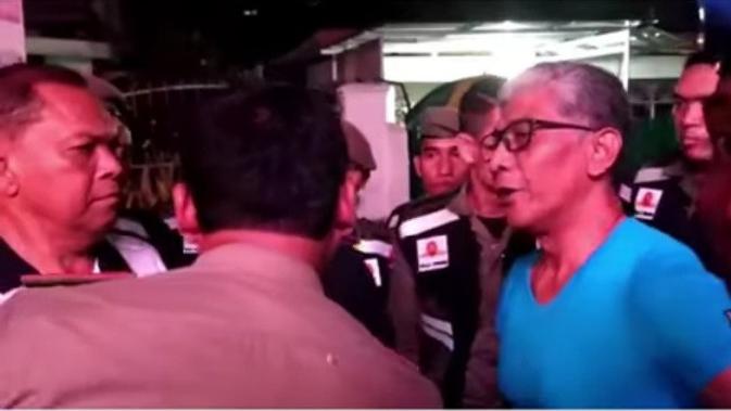 Potongan video keributan personel BNN Riau Kombes Iwan Eka Putra dengan Kepala Satpol PP Pekanbaru. (Liputan6.com/M Syukur)