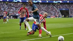 Alvaro Morata berhasil mencetak brace (12', 47'), dan Antoine Griezmann (47'). (AP Photo/Bernat Armangue)