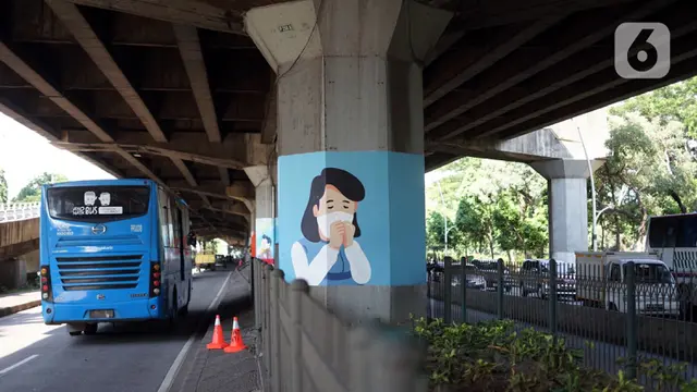 FOTO: Kolong Tol Ir. Wiyoto Wiyono Dihiasi Mural Bertema Covid-19