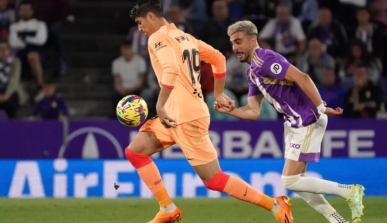 Kemenangan Atletico Madrid hadir berkat gol yang dicetak oleh Nahuel Molina, Jose Maria Gimenez, Alvaro Morata, Joaquin Fernadez (bunuh diri) dan Memphis Depay. (Photo by CESAR MANSO / AFP)