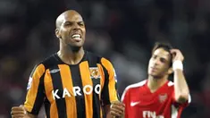 Hull City's Jamaican Marlon King celebrates after their Premiership match at The Emirates Stadium in London on September 27, 2008. Hull City won the game 2-1. AFP PHOTO/Adrian Dennis