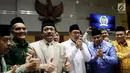 Menteri Agama Lukman Hakim Saifuddin (tiga kanan) usai rapat dengan Komisi VIII DPR di Jakarta, Senin (12/3). Rapat membahas pengesahan Biaya Penyelenggaraan Ibadah Haji (BPIH) 2018. (Liputan6.com/JohanTallo)