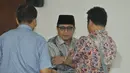 Waryono Karno berbincang saat menjalani sidang dengan agenda tanggapan jaksa penuntut umum (JPU) KPK atas nota keberatan atau eksepsi terdakwa di Pengadilan Tipikor, Jakarta, Senin (18/5/2015). (Liputan6.com/Herman Zakharia)