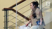 Lisa Mariana tidak bisa menjelaskan alasan apa yang melibatkannya sehingga keterangannya dibutuhkan KPK. (Liputan6.com/Helmi Fithriansyah)