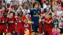 Ekspresi pemain Arsenal David Luiz setelah pemain Liverpool Mohamed Salah mencetak gol kedua ke gawang timnya saat bertanding dalam Liga Inggris di Stadion Anfield, Liverpool, Inggris, Sabtu (24/8/2019). Liverpool menang 3-1 dan kukuh di puncak klasemen sementara. (AP Photo/ Rui Vieira)
