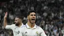 Gelandang Real Madrid, Marco Asensio merayakan setelah mencetak gol ketiga timnya ke gawang Celtic selama pertandingan Grup F Liga Champions di stadion Santiago Bernabeu di Madrid, Spanyol, Kamis (3/11/2022). El Real melaju bersama RB Leipzig yang mengunci posisi dua usai menang telak 4-0 atas Shakhtar Donetsk. (AP Photo/Manu Fernandez)