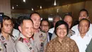 Menteri LHK, Siti Nurbaya bersalaman dengan Kapolri Jenderal Tito Karnavian di Gedung Manggala Wanabakti, Jakarta, Rabu (7/9). Kementerian LHK menggandeng Polri untuk mengatasi kejahatan kebakaran hutan dan lahan (Liputan6.com/Angga Yuniar) 