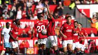 Selebrasi pemain Manchester United ketika melawan Nottingham Forest pada laga Liga Inggris 2023/2024 (AFP)