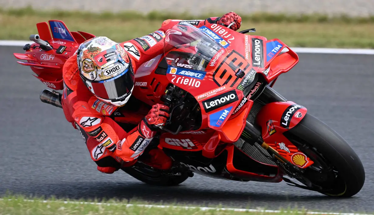 Untuk itu, Marc Marquez harus mampu meraih setidaknya tiga poin lebih banyak daripada rival terdekatnya, yang tak lain adalah sang adik, Alex Marquez. (TOSHIFUMI KITAMURA/AFP)