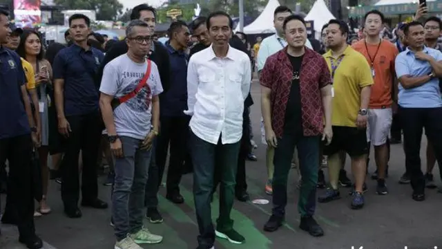 Jokowi nonton WTF 2018 (Hak Cipta: KapanLagi.com®/Agus Apriyanto/ssm)