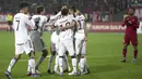 Para pemain Jerman merayakan gol lkay Gundogan ke gawang Armenia pada pertandingan sepak bola Kualifikasi Grup J Piala Dunia 2022 di Stadion Vazgen Sargsyan, Yerevan, Armenia, 14 November 2021. Jerman menang 4-1. (AP Photo/Pavel Golovkin)