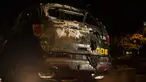 Kondisi belakang mobil polisi Georgia yang terbakar di kampus di Atlanta, AS (18/9). Mobil polisi tersebut diduga dibakar oleh pengunjuk rasa yang melakukan demonstrasi atas penembakan mahasiswa Georgia Tech Scout Schultz. (Foto AP / Kevin D. Liles)