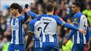 Selebrasi gelandang Brighton and Hove Albion, Kaoru Mitoma (kiri) dkk setelah mengalahkan Grimsby Town pada laga perempatfinal Piala FA 2022/2023 di Amex Community Stadium, Brighton (19/3/2023). Penampilan cemerlang Kaoru Mitoma bersama Brighton membuat nilai pasarnya meningkat drastis di angka 22 juta euro atau setara Rp362 miliar dan kini menjadi incaran beberapa klub besar Eropa seperti Manchester United, Arsenal dan Real Madrid. (AFP/Glyn Kirk)