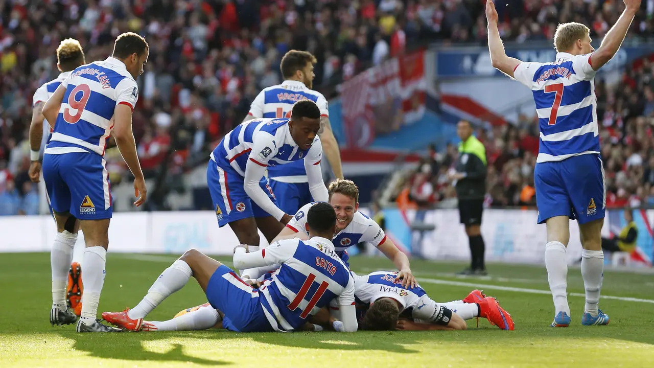 Para pemain Reading merayakan gol ke gawang Arsenal (Reuters)