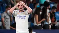 Gareth Bale - Mantan pemain Tottenham ini sempat menjadi andalan dan memegang peran penting dalam empat gelar di Liga Champions Real Madrid. Namun karena performanya terus menurun kini pemain berusia 32 tahun itu lebih sering menjadi penghangat di bangku cadangan. (AFP/Jose Miguel Fernandes)