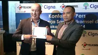 Foto: Kerjasama Telkomsel dengan Asurasni Cigna (Denny Mahardy/ Liputan6.com)