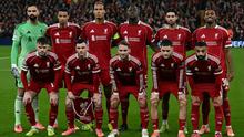 (Dari kiri ke kanan, baris belakang) Kiper Liverpool asal Georgia #25, Giorgi Mamardashvili, striker Liverpool asal Prancis #22, Hugo Ekitike, bek Liverpool asal Belanda #04, Virgil van Dijk, bek Liverpool asal Prancis #05, Ibrahima Konate, gelandang Liverpool asal Hungaria #08, Dominik Szoboszlai, dan gelandang Liverpool asal Belanda #38, Ryan Gravenberch, (Dari kiri ke kanan, baris depan) bek Liverpool asal Irlandia Utara #12, Conor Bradley, bek Liverpool asal Skotlandia #26, Andrew Robertson, gelandang Liverpool asal Argentina #10, Alexis Mac Allister, gelandang Liverpool asal Jerman #07, Florian Wirtz, dan striker Liverpool asal Mesir #11, Mohamed Salah, berpose untuk foto tim menjelang kick-off pertandingan League Phase Liga Champions UEFA antara Liverpool dan Real Madrid di Anfield, Liverpool, barat laut Inggris pada 5 November 2025. (Paul ELLIS/AFP)