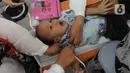 Hari ini bayi di Indonesia mendapatkan vaksin Rotavirus sebagai pencegah diare pada anak bayi yang dapat mengganggu tumbuh kembang yang di antaranya penyebab kekerdilan atau biasa disebut stunting. (merdeka.com/Imam Buhori)
