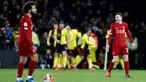 Pemain Liverpool Andrew Robertson (kanan) bereaksi setelah pemain Watford Troy Deeney mencetak gol ke gawang timnya dalam pertandingan Liga Inggris di Vicarage Road Stadium, Watford, Inggris, Sabtu (29/2/2020). Watford membantai Liverpool 3-0. (AP Photo/Alastair Grant)