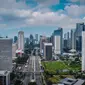 Foto udara suasana gedung bertingkat di kawasan Sudirman, Jakarta, Rabu (8/4/2020). Jakarta sempat menjadi kota paling berpolusi di dunia pada 29 September 2019 lalu, namun Rabu (8/4) siang ini, kualitas udara kota Jakarta membaik.  (Liputan6.com/Faizal Fanani)