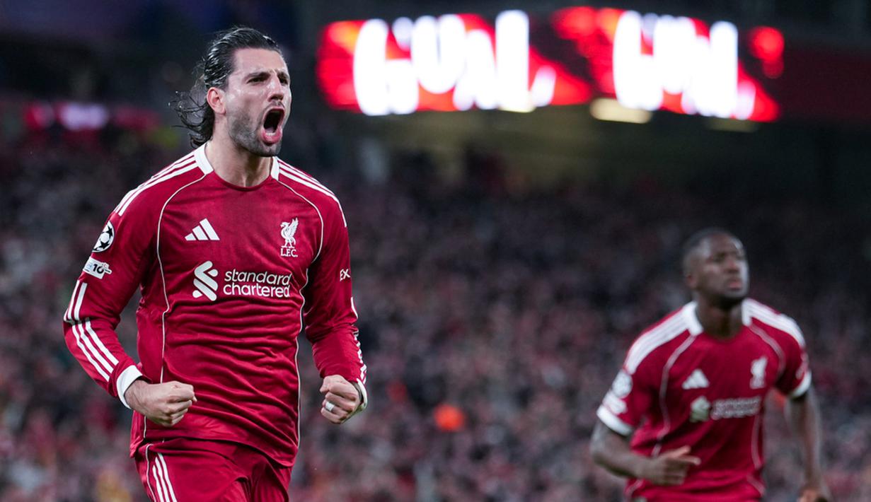 Pemain Liverpool, Dominik Szoboszlai, melakukan selebrasi setelah mencetak gol ke gawang Galatasaray pada leg kedua babak 16 besar Liga Champions 2025/2026 di Stadion Anfield, Kamis (19/3/2026). (AP Photo/Jon Super)