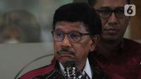 Menteri Komunikasi dan Informatika (Kemkominfo) Johnny G. Plate memberi keterangan pres usai menjalani pemeriksaan di Gedung Bundar, Kejaksaan Agung, Jakarta, Rabu (15/3/2023). (merdeka.com/Imam Buhori)