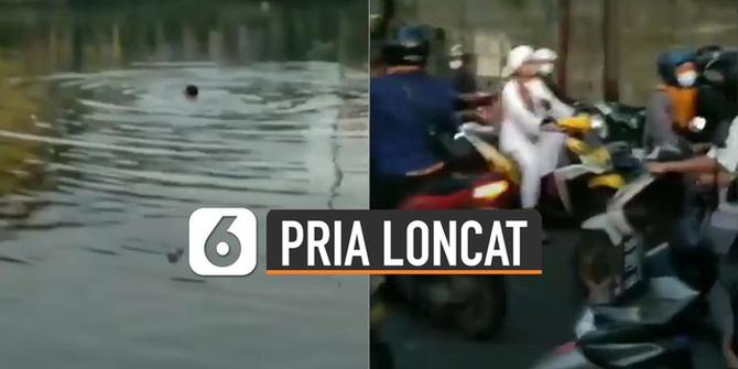 VIDEO: Viral Pria Loncat Ke Dalam Kanal Pampang, Ini Dia Penyebabnya