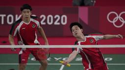 Memulai Olimpiade Tokyo, Kevin/Marcus berstatus ganda putra nomor satu dunia. Sementara Ben/Sean, berada di peringkat ke-18. (Foto: AP/Dita Alangkara)