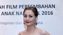 Peran yang bertolak belakang dengan kehidupan sehari-hari itu, membuat ibu dua anak itu menjadi tantangan tersendiri. (Galih W. Satria/Bintang.com)