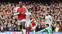 Striker Arsenal Eddie Nketiah berselebrasi setelah mencetak gol ke gawang Sheffield United dalam pertandingan Liga Inggris di Emirates Stadium, London, Sabtu, 28 Oktober 2023. (Glyn KIRK / AFP)