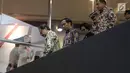 Presiden Joko Widodo didampingi Menteri Keuangan Sri Mulyani saat melihat pergerakan IHSG pasca Idul Fitri di Bursa Efek Indonsia, Jakarta, Selasa (4/7). (Liputan6.com/Angga Yuniar)