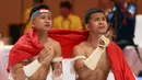 <p>Selebrasi atlet Kun Bokator putra Indonesia, Gema Nur Arifin dan Yazid Hanifam Kurniawan, setelah berhasil meraih medali emas dalam nomor Men's Duo Group Performance Kun Bokator SEA Games 2023 di Chrouy Changvar Convention Center, Phnom Penh, Kamboja, Senin (8/5/2023). (Bola.com/Abdul Aziz)</p>