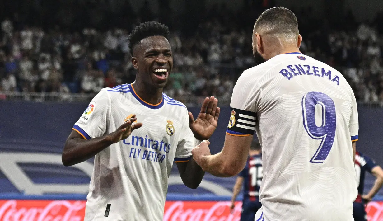 Vini juga mampu memberikan assist untuk gol Karim Benzema yang dicetak pada babak pertama. (AFP/Javier Soriano)