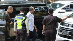 Wamenkumham memenuhi panggilan KPK untuk klarifikasi soal aduan penerimaan gratifikasi Rp 7 miliar.   (Liputan6.com/Herman Zakharia)