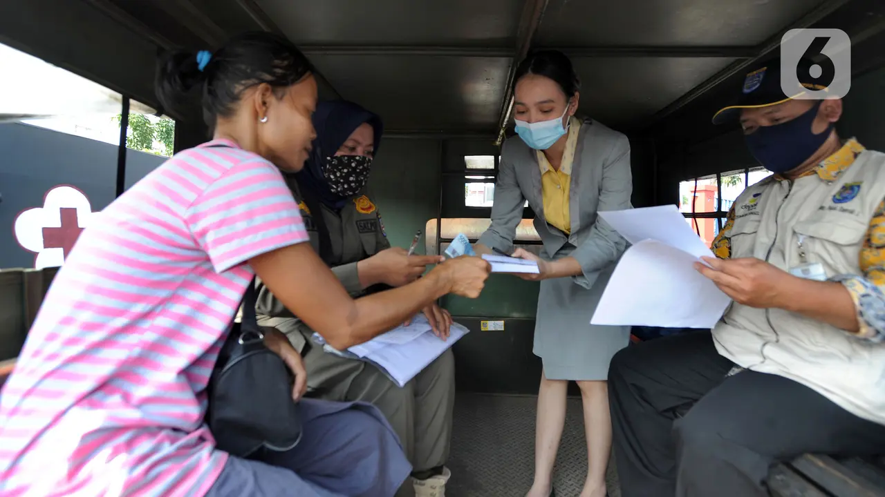 FOTO: Depok Mulai Denda Warga Tak Pakai Masker