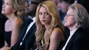 Shakira saat menghadiri pertemuan tahunan Forum Ekonomi Dunia (WEF) di Davos, Swiss (16/1). Penyanyi asal Kolombia dan Duta UNICEF tersebut Tampil cantik saat berbicara di acara Forum Ekonomi Dunia (WEF). (AFP Photo/Fabrice Coffrini)