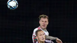 Aaron Ramsey mencetak gol ke-100 dalam kariernya saat membantu Wales mengalahkan Latvia. (AP Photo/Roman Koksarov)