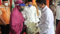 Pandemi Covid-19, Masyarakat dan Pemkot Adakan Program Tangerang Bersedekah. (Liputan6.com/Pramita Tristiwati)
