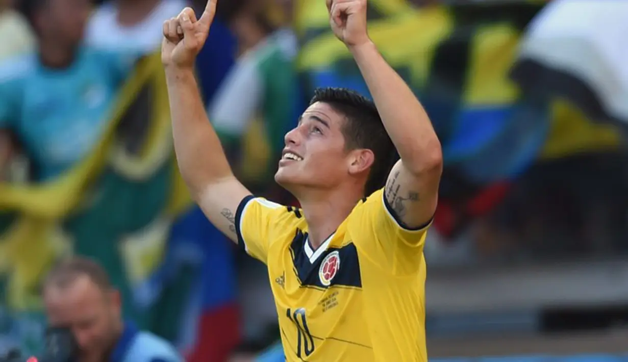 James Rodriguez merayakan golnya dengan selebrasi menatap langit saat Kolombia bertemu Yunani, Mineirao Arena, Belo Horizonte, Brasil (14/06/2014) (AFP PHOTO/PEDRO UGARTE)