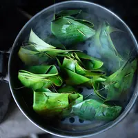 ilustrasi mengukus bungkus pisang/Pasuwan/Shutterstock