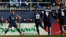 Selebrasi striker Real Madrid, Cristiano Ronaldo, setelah mencetak gol ke gawang Malaga dalam laga La Liga Spanyol di Estadio La Rosaleda, Minggu (21/2/2016) malam WIB. (AFP/Jorge Guerrero)