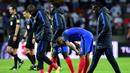 Para pemain Prancis terlihat kecewa saat gagal mengalahkan Belarusia pada kualifikasi Piala Dunia 2018 di Borisov Arena, Borisov, Belarusia. (AFP/Franck Fife)