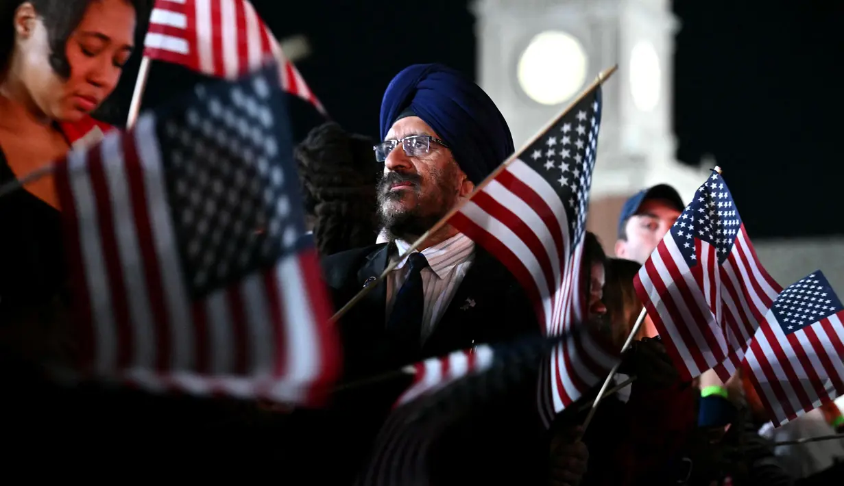 Electoral College terdiri dari sekelompok orang yang mewakili 50 negara bagian di Amerika Serikat untuk memilih seorang presiden dan wakil presiden. Mereka dipilih dan ditentukan oleh tiap-tiap warga negara bagian. (ANGELA WEISS/AFP)