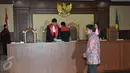 Ramapanicker Rajamohanan Nair, terdakwa penyuap pejabat pajak, usai divonis hakim di Pengadilan Tipikor, Jakarta, Senin (17/4). Ramapanicker divonis tiga tahun penjara dan denda Rp200 juta subsidier lima bulan kurungan. (Liputan6.com/Helmi Afandi)