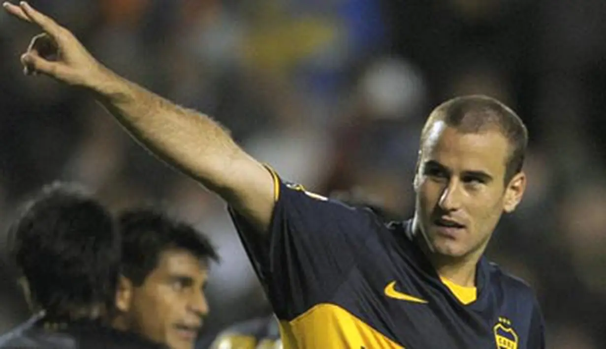 Penyerang Boca Juniors, Rodrigo Palacio merayakan golnya ke gawang Deportivo Tachira dalam pertandingan penyisihan Grup 2 Copa Libertadores di Stadion La Bombonera, Buenos Aires, 30 April 2009. AFP PHOTO/Juan Mabromata